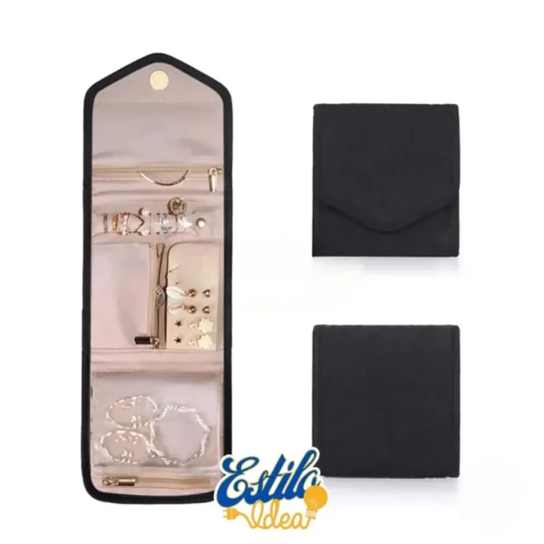 An unfolded and folded black travel jewelry organizer are displayed. The unfolded view reveals various compartments holding rings, earrings, necklaces, and bracelets. The folded view shows a compact and sleek design. The logo "Estilo Idea" is at the bottom center.